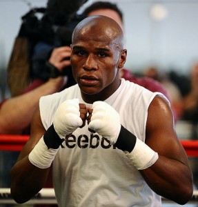 Floyd "Money" Mayweather Jr. works out during a Labor Day themed open media workout at his boxing gym in Las Vegas as he prepares for his September 19 fight against Juan Manuel "Dinamita" Marquez at MGM Grand and televised live on HBO Pay-Per-View. Las V